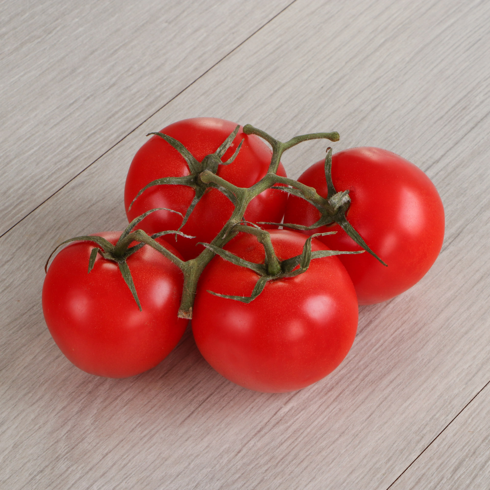 

Томаты розовые на ветке