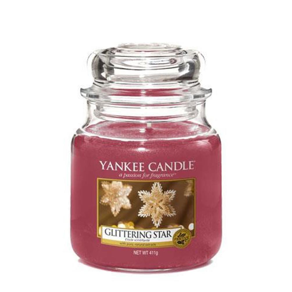 фото Ароматическая свеча yankee candle средняя сверкающая звезда 411 г