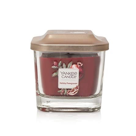 фото Свеча ароматическая yankee candle elevation праздничный гранат