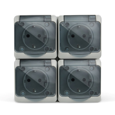 Изображение товара Розетка Tokov Electric Nix 4-м с заземлением с прозрачной крышкой серая